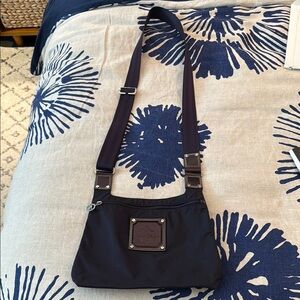 Longchamp Dark Purple Crossbody Bag with Sleek Design